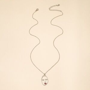 3/$30 🤍 Abstract Face Necklace